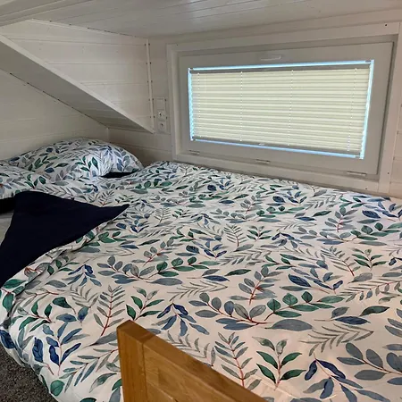 Tiny House Azyl Wolnosci בית נופש פוז'ז'דז'ה